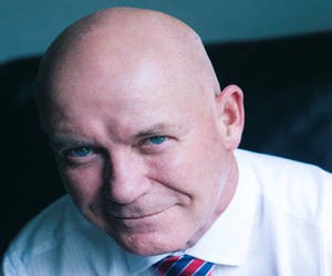 gary sweet white shirt with blue and red tie