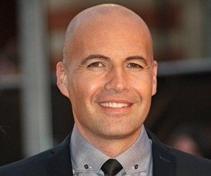 Billy Zane wearing suit and tie