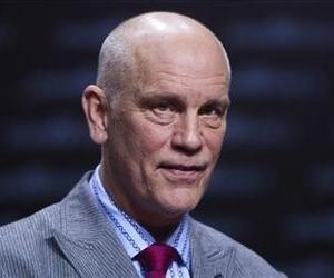 John malkovich wearing suit and tie