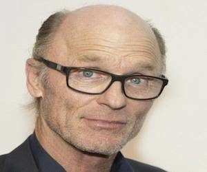 Ed Harris Bald Actor wearing glasses